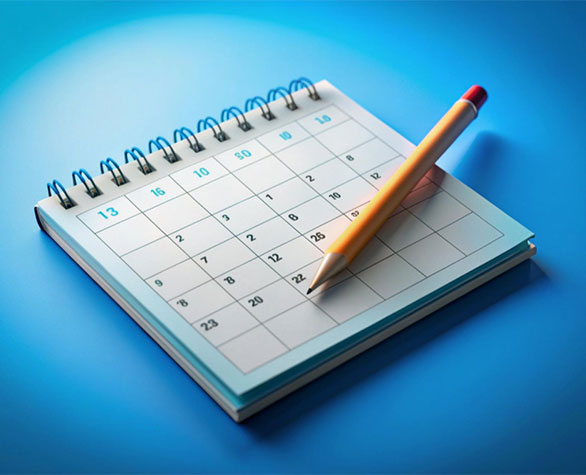 3d calendar with pencil resting on top